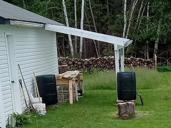 building-the-old-window-greenhouse-rain-barrels600x450.jpg